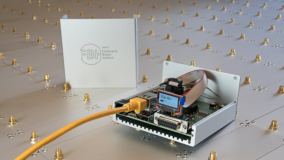 IoT device developed at FBH for the query of plant sensors. One can see the open housing 