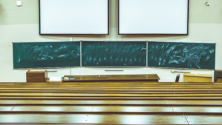 Illustrative image showing an empty lecture hall