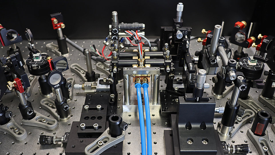 Fig. 1. Photograph schowing the coherent beam combining (CBC) setup of two individual tapered optical amplifiers (TPAs) at 808 nm.