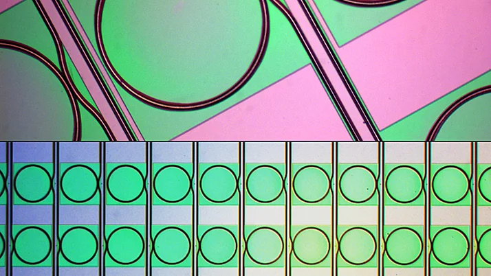 Abstract composition with several superimposed circles in different colors, including green and pink. The upper half has a diagonal pattern, while the lower half shows a series of evenly arranged, transparent circles.