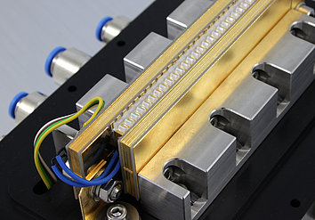 Diode laser stack with lenses