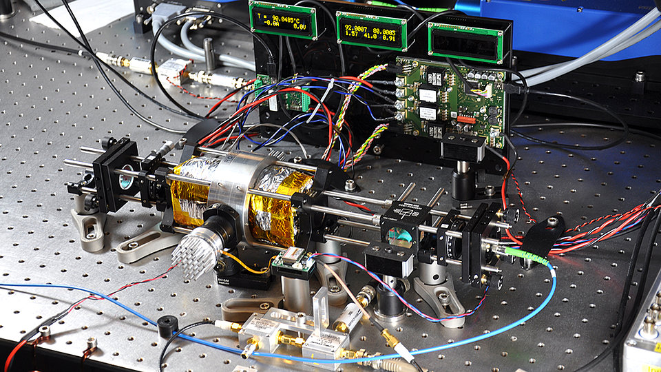 Fig. 1: Photograph showing the laboratory setup of the two-photon frequency reference.