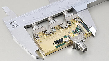 Digital GaN-based transceiver module in a caliper. 