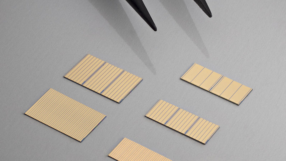 Broad-area lasers: kW-class diode laser bars before mounting