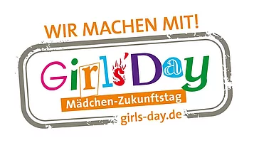 Logo des Girls' Day mit der Aufschrift "Wir machen mit!" und dem Untertitel "Mädchen-Zukunftstag." Das Logo ist bunt gestaltet und enthält die Website girls-day.de. 