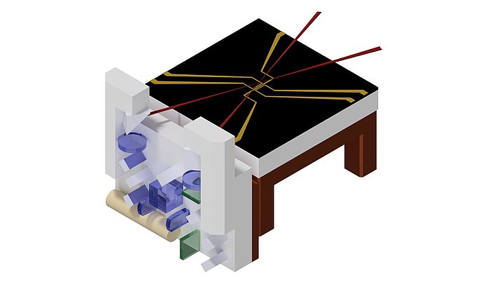 Illustration of a chip mounting device. The plate has a black surface pattern with yellow and red lines. Various colored components are visible under the plate.