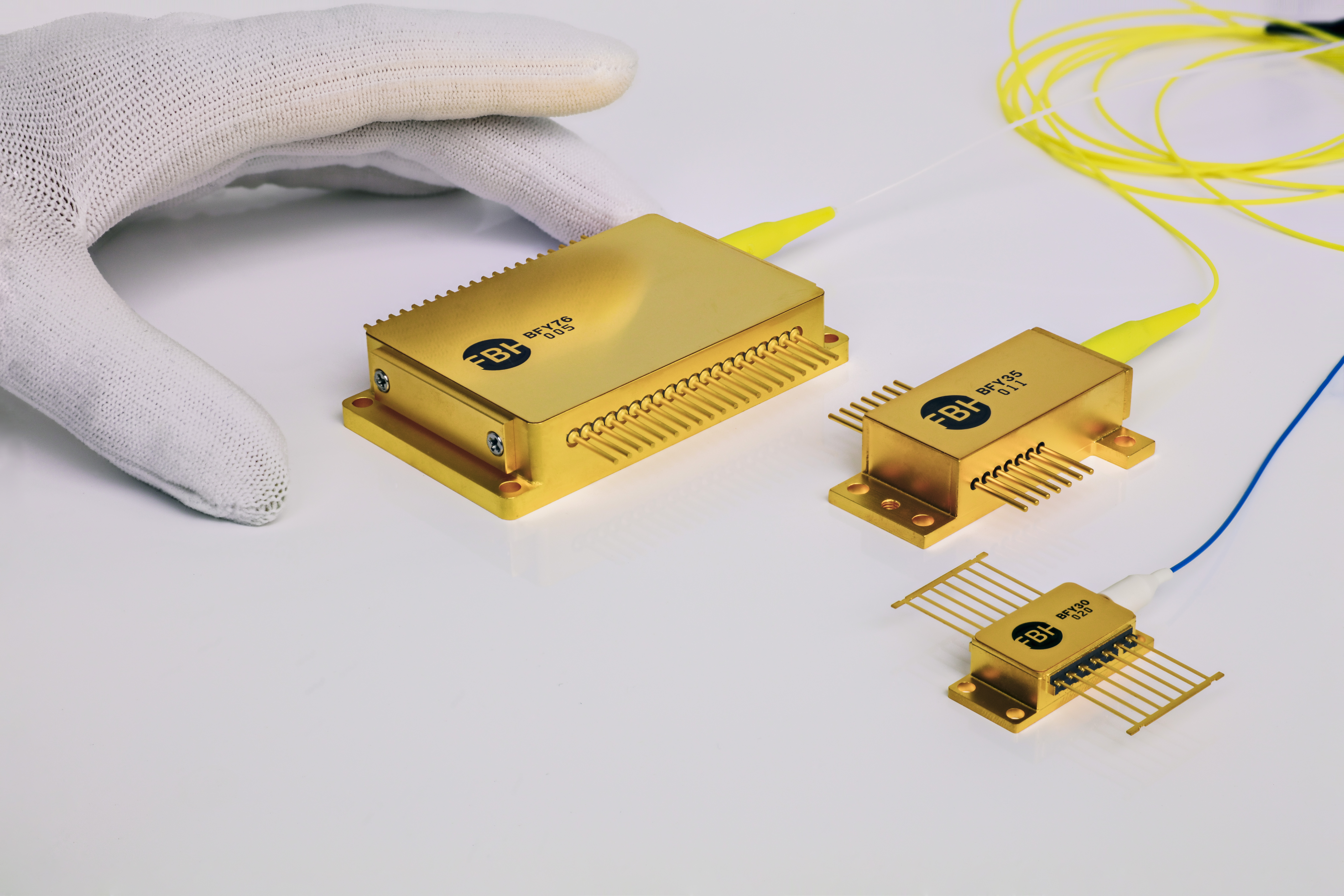 three fiber-coupled diode laser modules next to each other